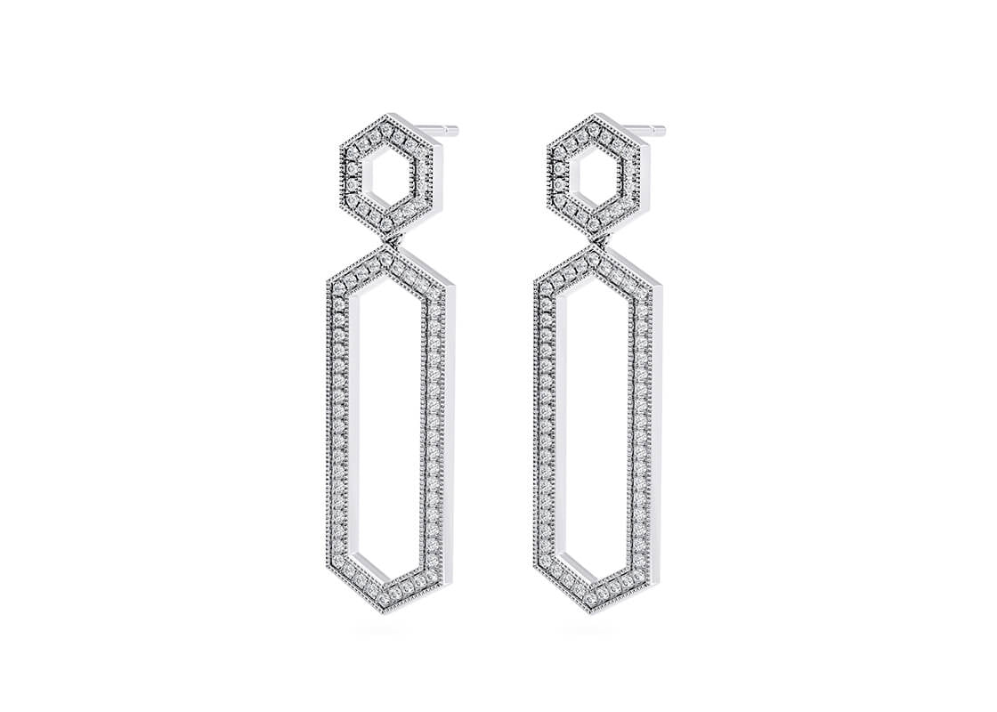 A statement in timeless glamour, the Astoria Drops channel the elegance of the roaring twenties with a bold, geometric twist. Featuring hexagon-shaped studs, these earrings blend vintage charm with sleek modern style.
