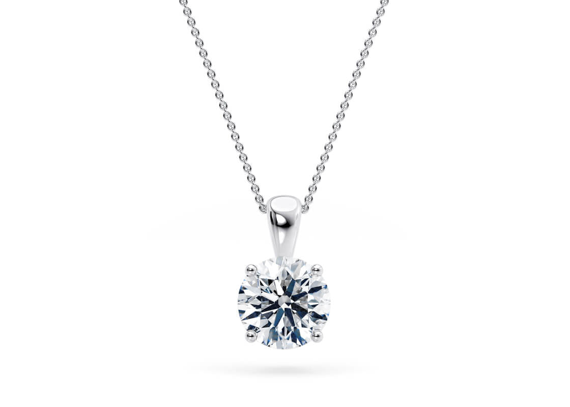 Pure and understated, the Solara Pendant showcases your chosen diamond or gemstone in a refined four-claw setting. Designed to let light flow freely around the stone, this minimalist piece creates a radiant shimmer with every movement-perfect for adding effortless elegance to any look.