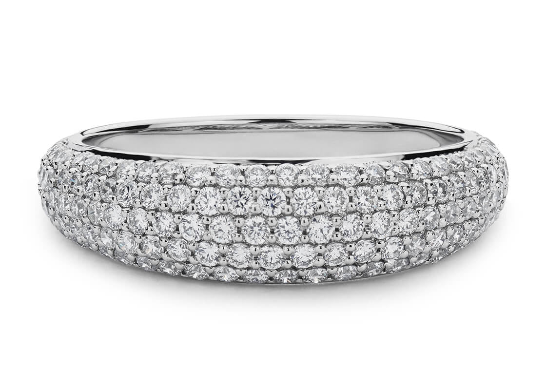 Elegant and full of sparkle, the Solaria Mini captures the timeless glow of diamonds in a refined, wearable design. With five glittering rows of pavé-set gems, this radiant piece adds instant brilliance-perfect for everyday luxury or as a standout addition to your collection.