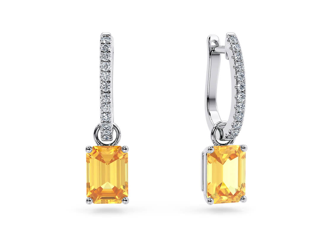 Brighten even the dullest days with the radiant Helia Drops. Featuring vibrant citrine stones paired with sparkling diamond-set hoops, their interchangeable design lets you switch effortlessly between full drops or classic diamond hoops for any occasion.