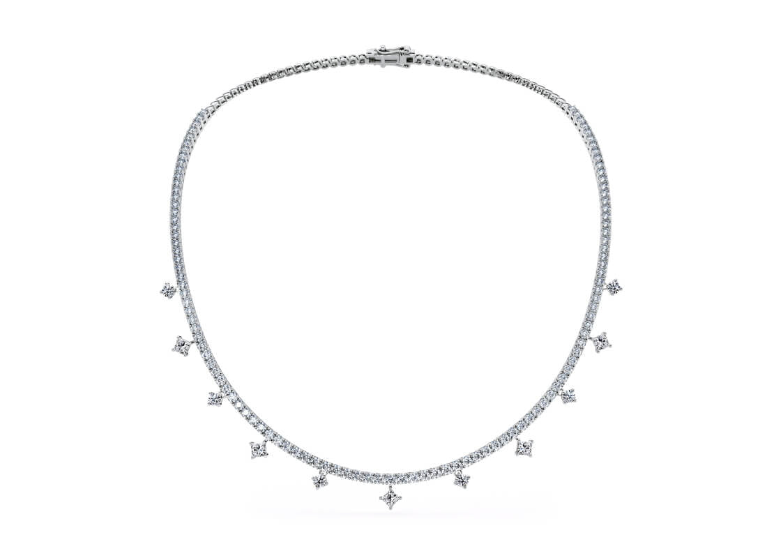 Featuring a dazzling constellation of princess and round drop diamonds, our Starlight necklace is inspired by a night’s sky. Each diamond drop is compass-set to resemble the brightest of stars.