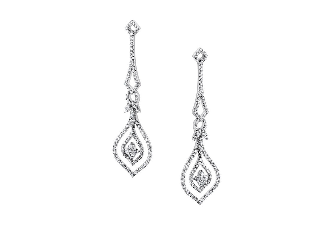 Blending sharp angles with soft curves, this elegant teardrop design catches the light beautifully, adding a sparkling touch that moves with you wherever you go.