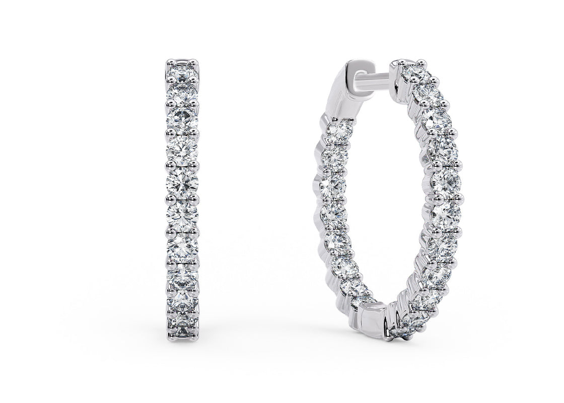 Simple, stylish, and made to shine - the Mira Hoops are your go-to pair for everyday elegance. With diamonds delicately set along each side, these classic hoops catch the light from every angle, adding just the right amount of sparkle to your daily look.