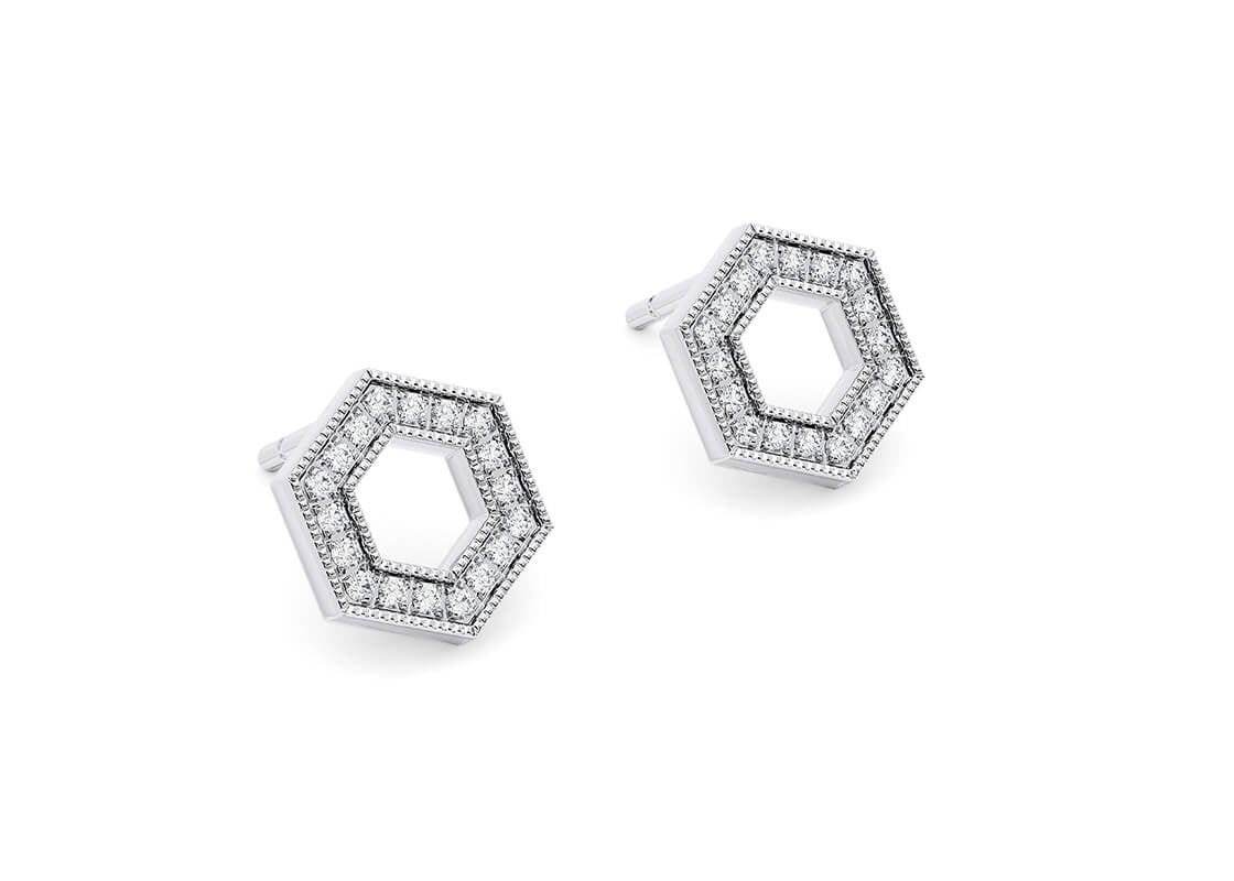 With their striking hexagonal shape, the Astra Hex studs blend modern elegance with understated charm. Accented by petite round brilliant diamonds, they offer a subtle sparkle and timeless appeal.