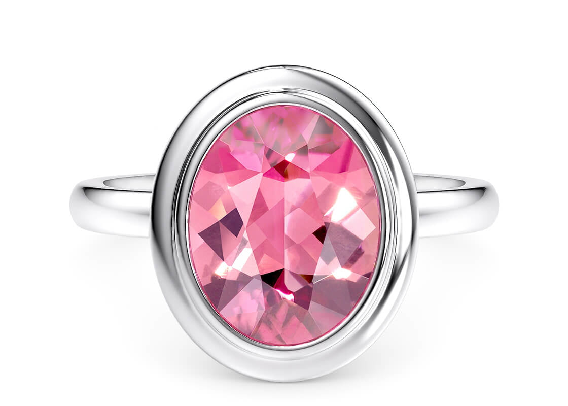Crafted to let color shine, the Roselle Oval draws your attention straight to the centre gemstone. A soft pink tourmaline is framed in a double-stepped bezel, giving the piece a bold outline while keeping its elegant, timeless charm intact.