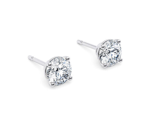 A classic design that beautifully showcases your chosen diamonds, held safely in a four-claw setting to let their natural sparkle take center stage.
