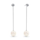 These elegant earrings combine the gentle movement of two matching Akoya pearls with a subtle sparkle of diamonds. When you want a simpler look, the diamond studs can be worn alone, offering versatile style for any occasion.