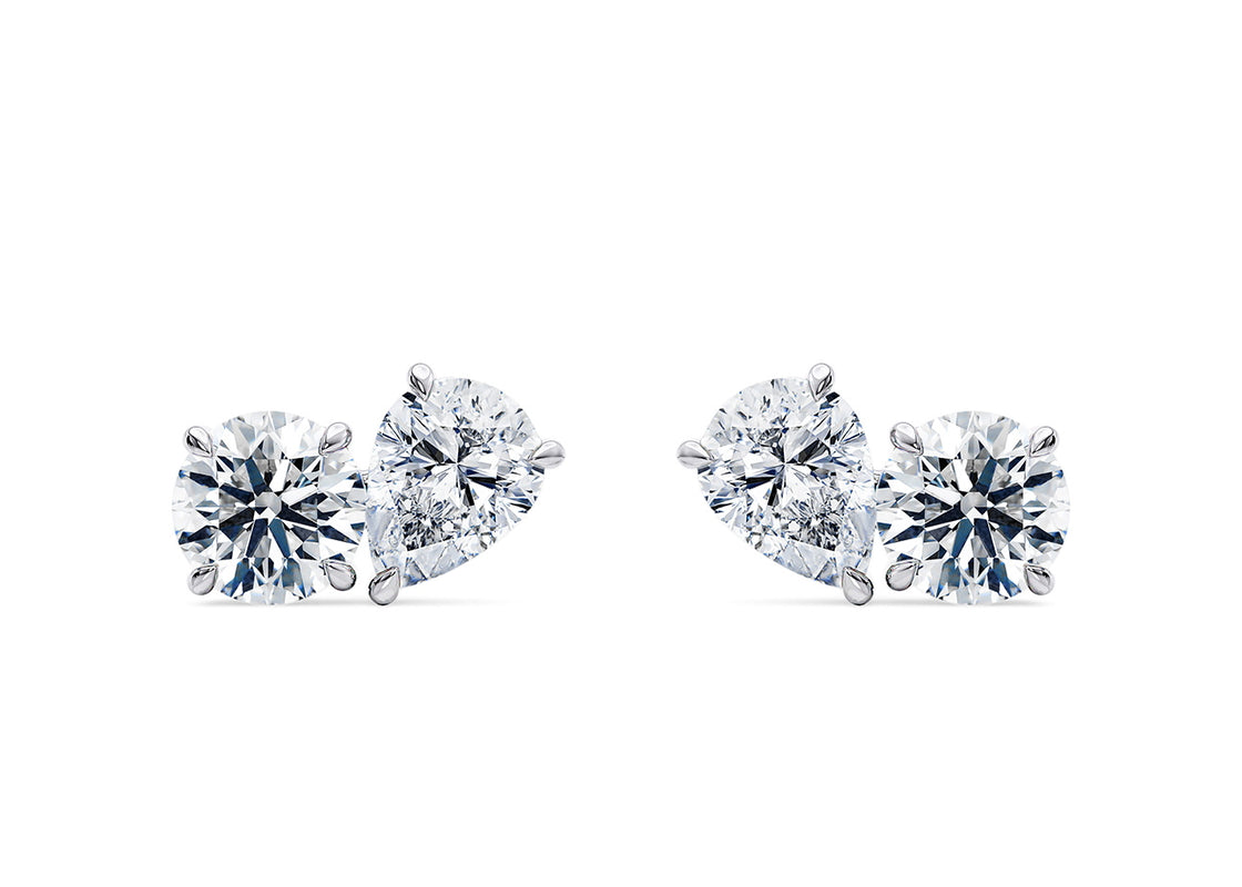 Bright and graceful, the Harmony Studs pair a round and pear-shaped diamond to symbolize balance and unity - perfect for adding a subtle yet meaningful sparkle to your look.
