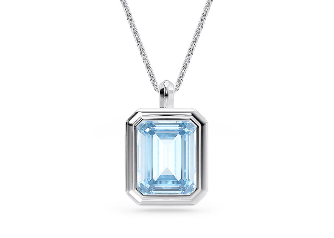 Echoing the bold charm of the Cala Cocktail Ring, the Octavia Blue pendant features an octagon-cut aquamarine, perfectly framed in a sculpted stepped bezel setting. Designed to catch and reflect light from every angle, this piece brings out the stone’s cool, oceanic hues for a refreshingly radiant finish.