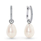 Embracing a minimalist style, the Liora Drops bring a fresh take on classic pearl elegance. Featuring two matching freshwater pearls, these versatile earrings allow you to wear the pearls separately from the hoops for effortless style that adapts to your mood.