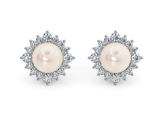 Delicately framed by a sparkling diamond halo, these studs showcase two perfectly matched round Akoya pearls. Radiant and elegant, the Maris Studs make a stunning addition to any jewellery collection.