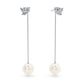 Sparkling diamond clusters gently lead to matching Akoya pearl drops in the Livia design. With a soft floral motif and a delicate sheen, these earrings blend vibrant elegance with timeless charm.